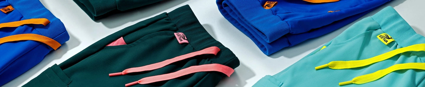 Women’s scrub pants by Estiva in Royal Blue, Deep Teal, and Light Turquoise