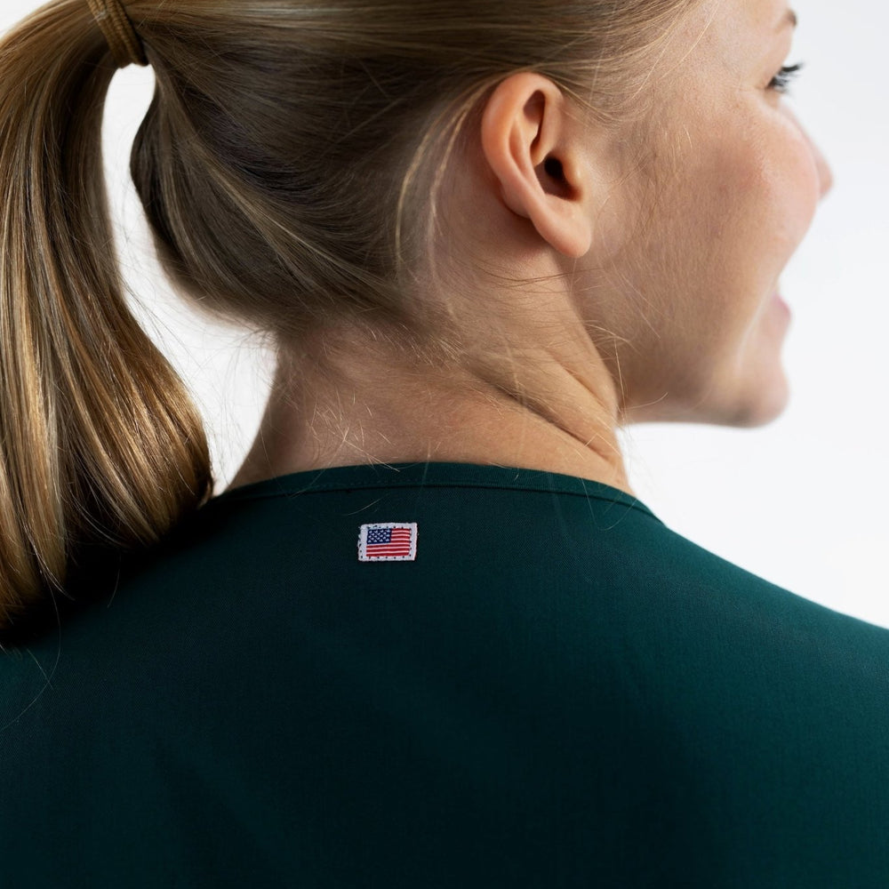 
                  
                    TOP - DEEP TEAL medical scrubs by Estiva – modern uniform for healthcare professionals
                  
                