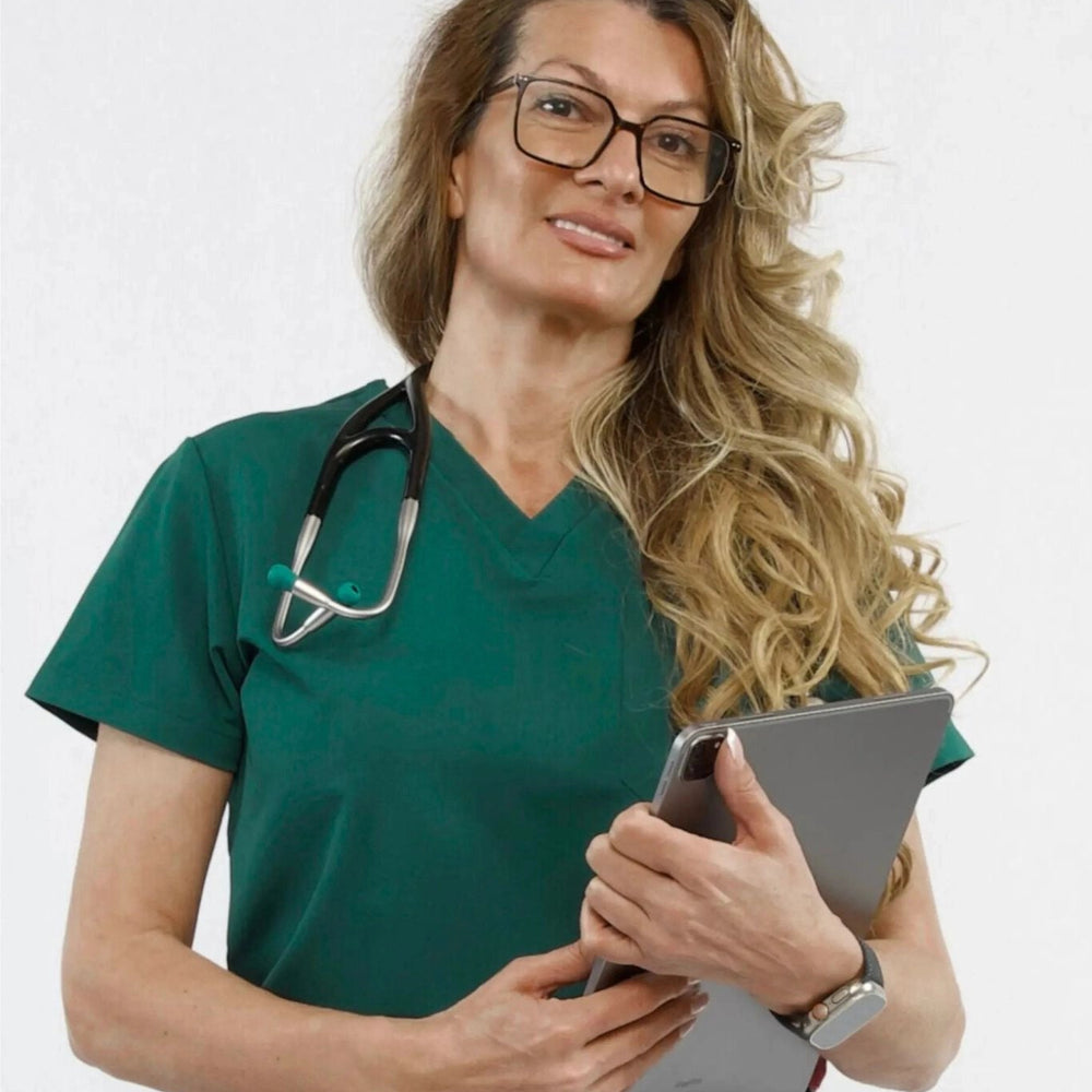 
                  
                    TOP - DEEP TEAL medical scrubs by Estiva – modern uniform for healthcare professionals
                  
                