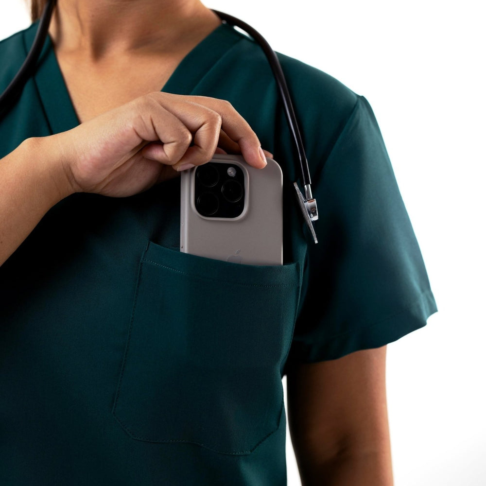 
                  
                    TOP - DEEP TEAL medical scrubs by Estiva – modern uniform for healthcare professionals
                  
                