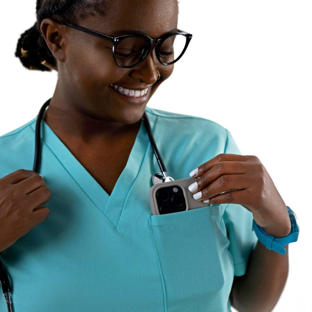 
                  
                    TOP - LIGHT TURQUOISE medical scrubs by Estiva – modern uniform for healthcare professionals
                  
                