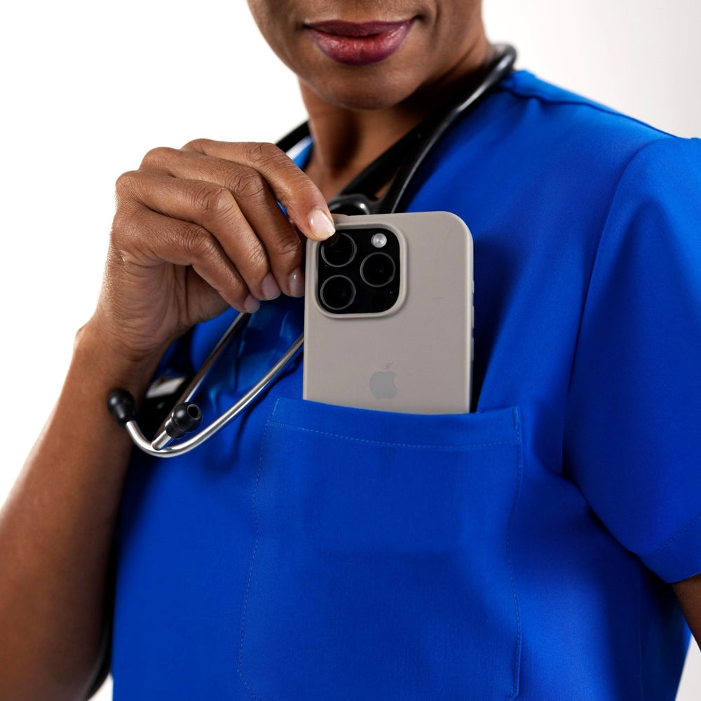 
                  
                    TOP - ROYAL BLUE medical scrubs by Estiva – modern uniform for healthcare professionals
                  
                