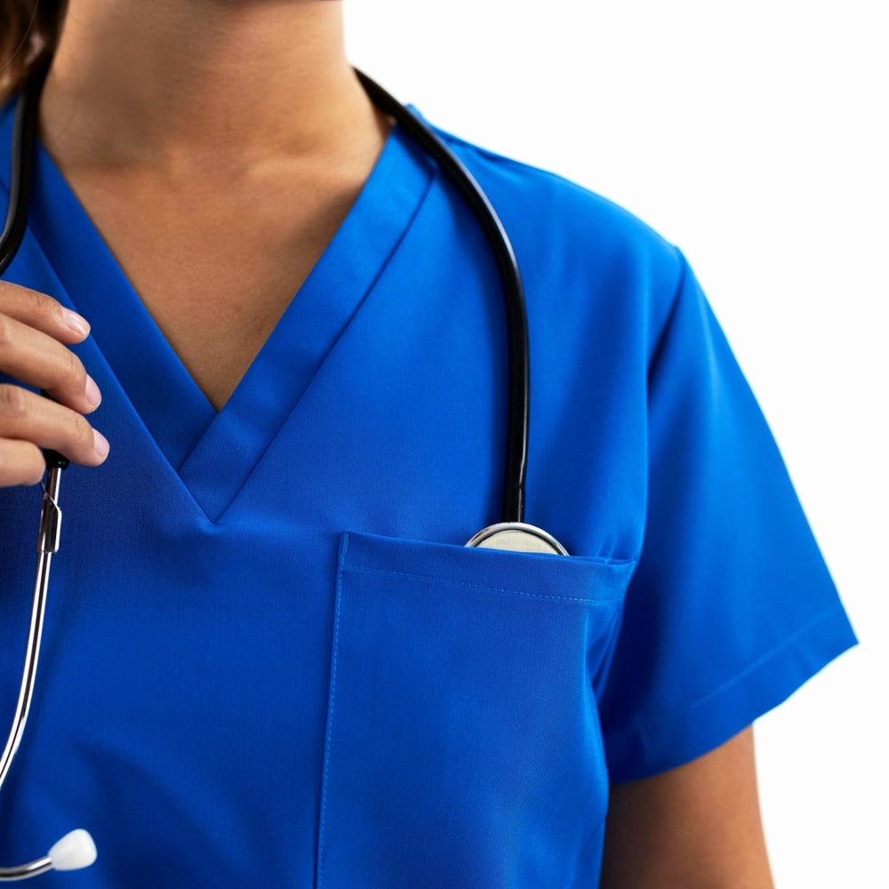 
                  
                    TOP - ROYAL BLUE medical scrubs by Estiva – modern uniform for healthcare professionals
                  
                