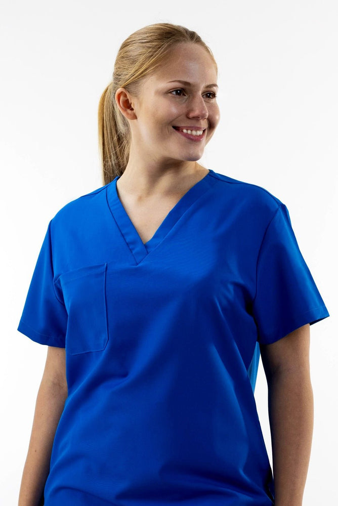
                  
                    TOP - ROYAL BLUE medical scrubs by Estiva – modern uniform for healthcare professionals
                  
                